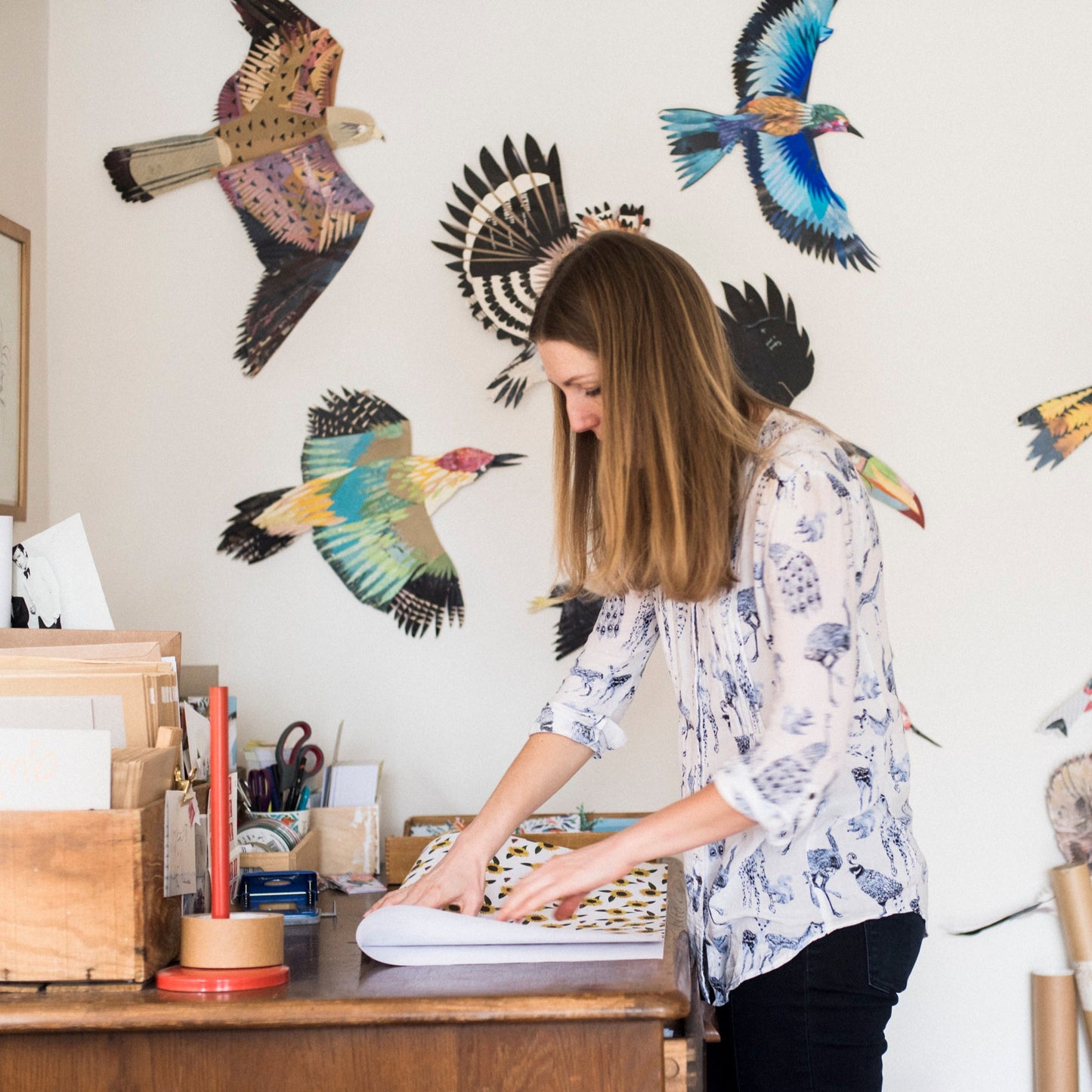 Kate Slater in her studio folding wrapping paper